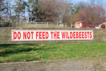 do not feed the wildebeest sign