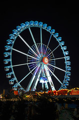 Colorful illuminated big wheel at the Christmas market in Berlin, Germany.