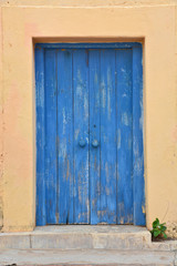 A wooden door, with traditional carvings, in Stonetown, Zanzibar. 