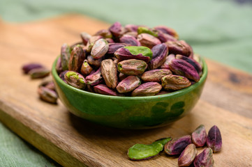 High quality green pistachio nuts growing on slopes of Mount Etna in Bronte, Sicily, Italy