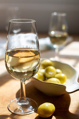 Sherry wine tasting, dry fino, manzanilla or palomino jerez fortified wine in glasses, Jerez de la Frontera, Andalusia, Spain