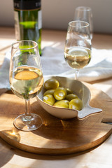 Sherry wine tasting, dry fino, manzanilla or palomino jerez fortified wine in glasses, Jerez de la Frontera, Andalusia, Spain