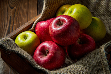 Apples on wood background