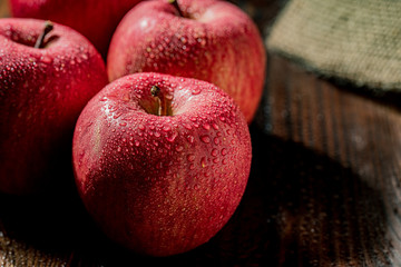 Apples on wood background