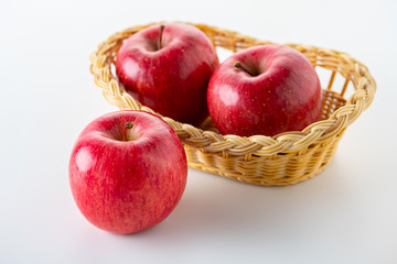 Red apples on white background