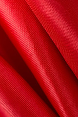 Red silk satin abstract textured background