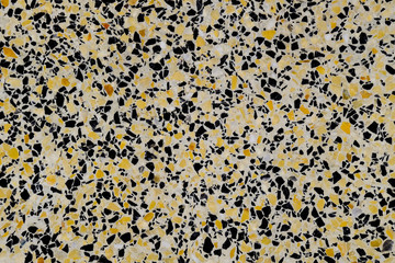 Marble tiles interspersed with granite. The texture of paving sl