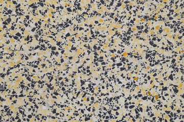 Marble tiles interspersed with granite. The texture of paving sl