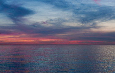 Obraz premium fantastic setting of sun with many colors in background