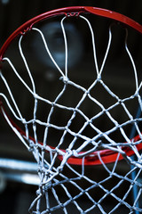 Fototapeta na wymiar basketball net on black background