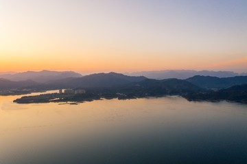 Fototapeta na wymiar Beautiful Landscape of Taiping Lake in Huangshan City at Sunset in China