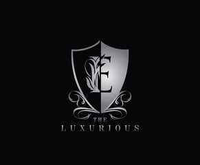 Luxury Guard E Letter Logo Icon. Silver E With Classy Shield Shape design perfect for fashion, Jewelry, Beauty Salon, Cosmetics, Spa, Hotel and Restaurant Logo. 