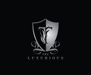 Luxury Guard T Letter Logo Icon. Silver T With Classy Shield Shape design perfect for fashion, Jewelry, Beauty Salon, Cosmetics, Spa, Hotel and Restaurant Logo. 