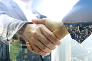 Holding hands with business partners to trust business partners, relationships to achieve future...
