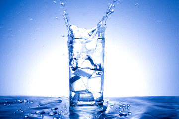 Clean water for good health. Pouring Fresh Pure Water From Pitcher Into A Glass on table wooden. Health And Diet Concept. Lifestyle Healthcare And Beauty.
