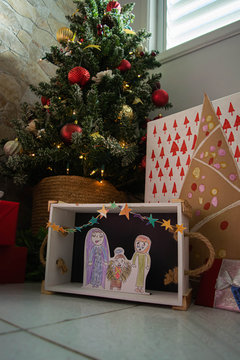 Christmas decorations: hand made manger and presents