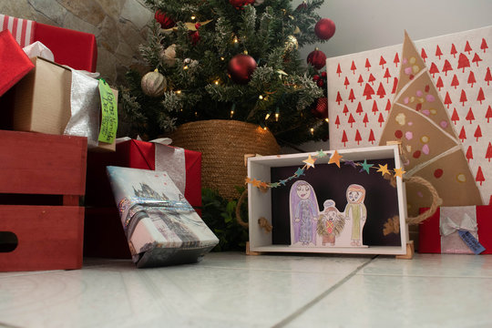 Christmas decorations: hand made manger and presents