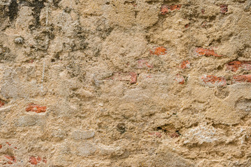 old ruins brick wall with concrete cracked