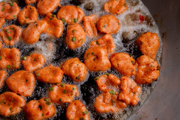 Making delicious fried fish cake in hot oil. The name of this menu is Tod Mun Pla Krai.