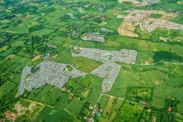 Showing the changing rural landscape of the Philippines, with agricultural land being turned into...