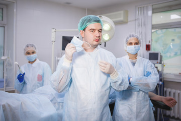 Surgeon and his team