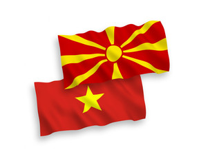 Flags of North Macedonia and Vietnam on a white background