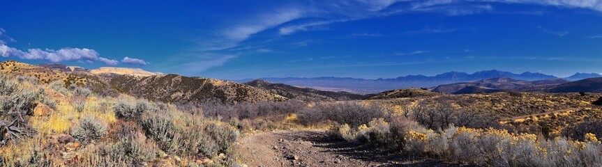 Views of Wasatch Front Rocky Mountains from the Oquirrh Mountains with fall leaves, Hiking in Yellow Fork trail and Rose Canyon in Great Salt Lake Valley. Utah, United States. USA.