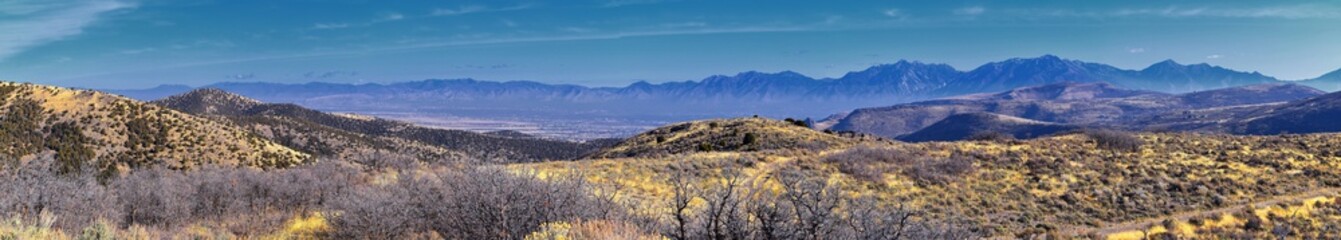 Views of Wasatch Front Rocky Mountains from the Oquirrh Mountains with fall leaves, Hiking in Yellow Fork trail and Rose Canyon in Great Salt Lake Valley. Utah, United States. USA.