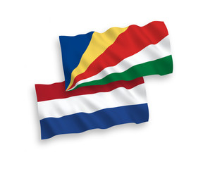 Obraz premium Flags of Seychelles and Netherlands on a white background