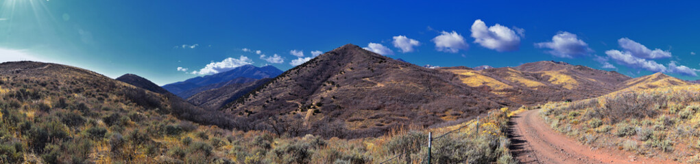 Views of Wasatch Front Rocky Mountains from the Oquirrh Mountains with fall leaves, Hiking in Yellow Fork trail and Rose Canyon in Great Salt Lake Valley. Utah, United States. USA.