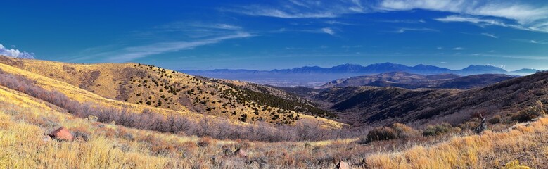 Views of Wasatch Front Rocky Mountains from the Oquirrh Mountains with fall leaves, Hiking in Yellow Fork trail and Rose Canyon in Great Salt Lake Valley. Utah, United States. USA.