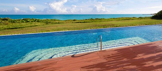 Beautiful view from the pool to the sea. Horizontal.