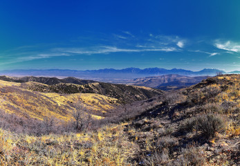 Views of Wasatch Front Rocky Mountains from the Oquirrh Mountains with fall leaves, Hiking in Yellow Fork trail and Rose Canyon in Great Salt Lake Valley. Utah, United States. USA.