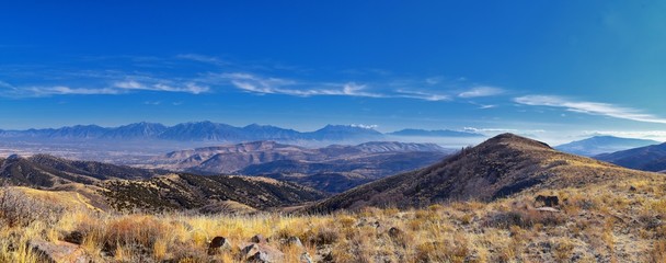 Views of Wasatch Front Rocky Mountains from the Oquirrh Mountains with fall leaves, Hiking in Yellow Fork trail and Rose Canyon in Great Salt Lake Valley. Utah, United States. USA.