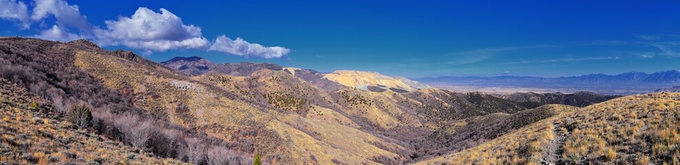 Views of Wasatch Front Rocky Mountains from the Oquirrh Mountains with fall leaves, Hiking in Yellow Fork trail and Rose Canyon in Great Salt Lake Valley. Utah, United States. USA.