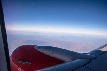 Fototapeta na wymiar Plane. View from above In passenger plane