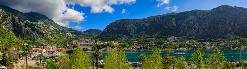 Fototapeta na wymiar Panorama of Kotor Bay with mountains and crystal clear water in the Balkans, Montenegro on the on Adriatic Sea