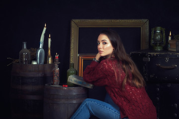 young woman with candles on dark background, divination and spiritualism