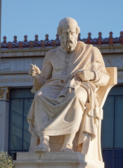 Fototapeta premium Plato the ancient greek philosopher in front of the national academy neoclassical building, Athens Greece