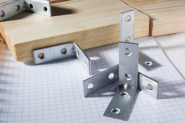 Metal corners for fastening wooden boards