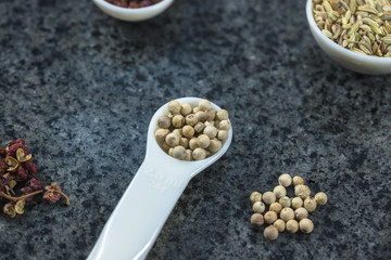 Various edible spices and condiments are placed together.