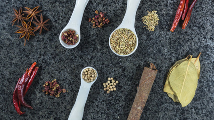 Various edible spices and condiments are placed together.