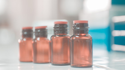 Brown bottle on blur background.