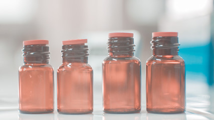 Brown bottle on blur background.