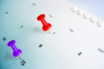 Thumbtack a date on calendar concept for important date, meeting reminder, planning for business,...