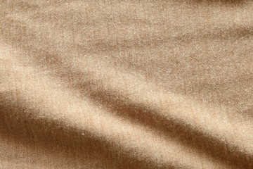 Top view of Beautiful cloth fabric texture background of brown and white dress. Soft surface detail with wave and motion. Decorative, winter, keep body warm fashion concept with copy space for text.