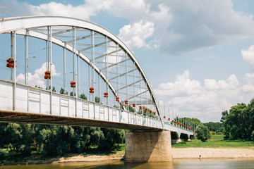 Naklejka premium Belvarosi Hid bridge and Tisza River in Szeged, Hungary