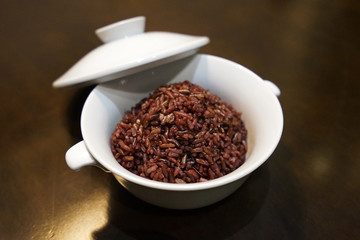 Close up bowl of steamed brown rice