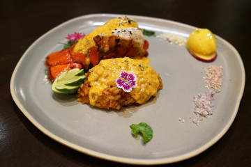 Close up plate of grilled Lobster served with garlic rice
