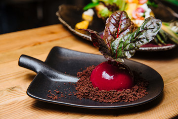 Vanilla-coconut mousse in the form of beets.